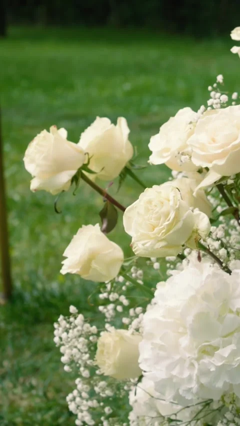 Beautiful white roses and eustoma flowers. Decor and floristry. Stock Footage 321930316