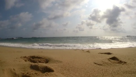 Beautiful white sand beach - Camera is crashed by the waves 库存影片 100267847