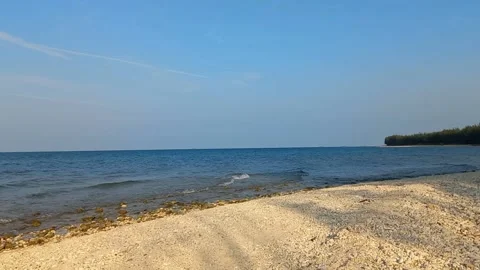 Beautiful white sand seascape sunset beach with calm wave Video stock 235786341