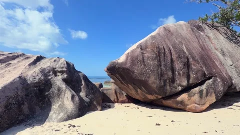 Beautiful white sandy beach and huge granite stones, Baie Lazare beach Stock Footage 330855192