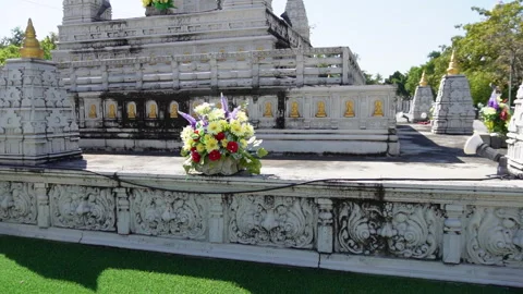 Beautiful-white-stucco-railing-with-flower-decoration-at-temple Stock Footage 345324140