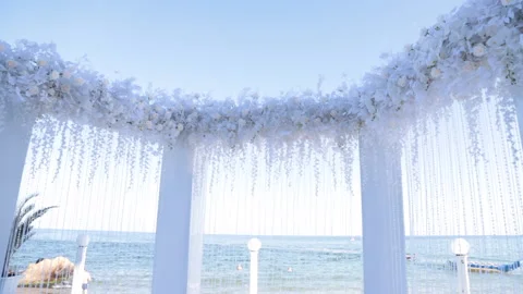 Beautiful white wedding arch on the background of the sea Stock Footage 146259284