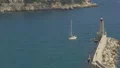 Beautiful white yacht floating on sea waves, arriving to Nice port, vacation HD Footage