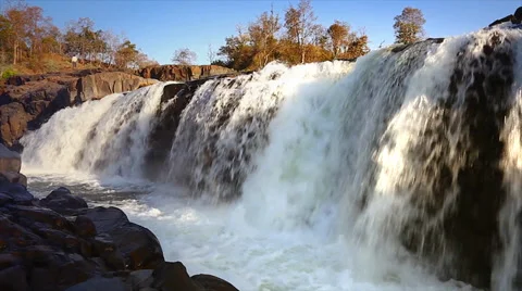 A beautiful wide and low angle view of a waterfall in Bandhavgarh, India. Stock Footage 37521147