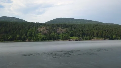 Beautiful wide angle view on the forest near the riverside Stock Footage 94247621