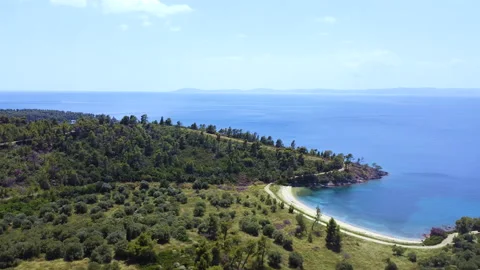 Beautiful wild nature and empty beach by the blue clear sea. Aerial view Видео 135329361