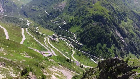 The beautiful winding road, Aerial view of the road to Furkapass in the Swiss Al Stock Footage 312702894