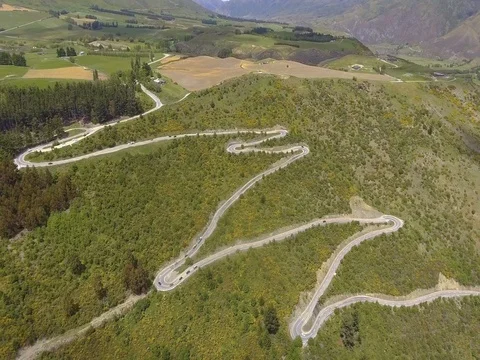 Beautiful Winding Road on Mountains near Queenstown, New Zealand Stock Footage