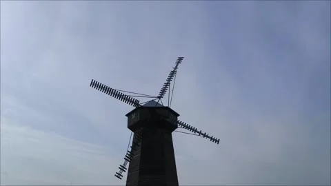 Beautiful windmill against a clear gray sky Stock Footage 304812008