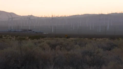 Beautiful windmill farm during sunset Stock Footage 99076930