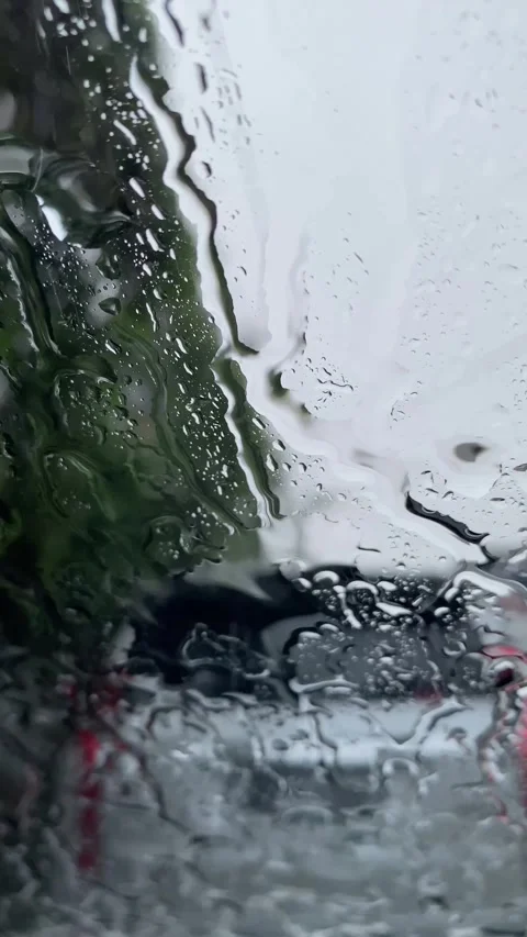 Beautiful window with rain falling on it Video stock 299708655