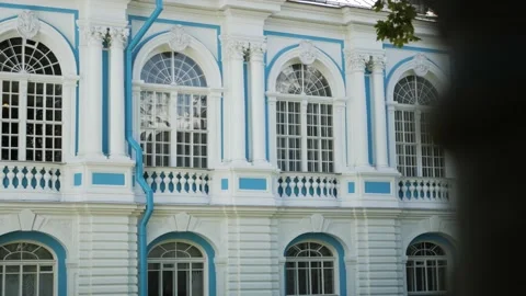 Beautiful windows of an old palace, outside view, sunny day, 4K video Stock Footage 165721744