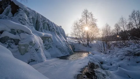 Beautiful winter landscape, the movement of the sun through a tree in winter, a Stock Footage 170203207