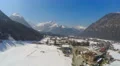 Beautiful winter landscape, peaceful mountain resort town, dolly zoom animation 4k or 4k+ Resolution
