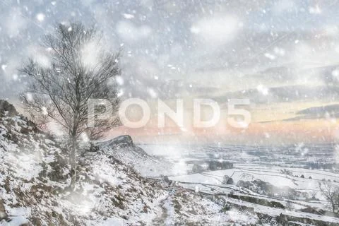 Beautiful Winter landscape at vibrant sunset over snow covered countryside in Stock Photos