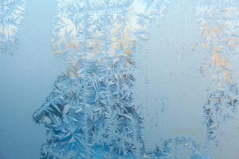 Beautiful winter texture patterns of frost on window Stock Photos