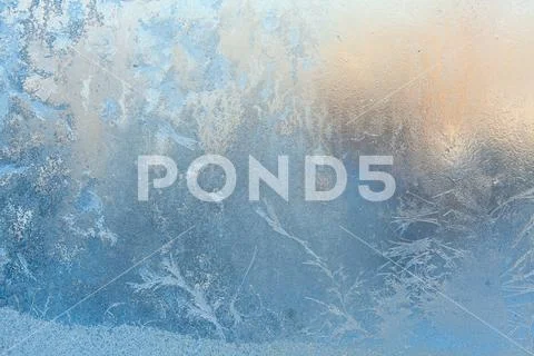 Beautiful winter texture patterns of frost on window Stock Photos