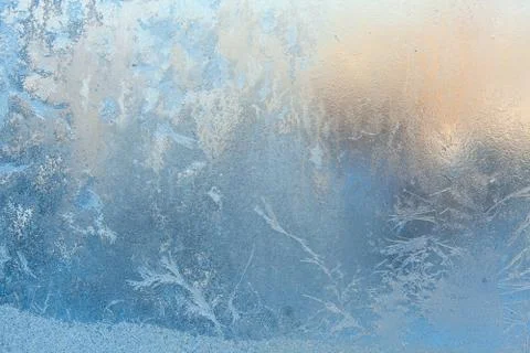 Beautiful winter texture patterns of frost on window Stock Photos