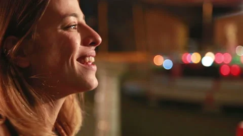 Beautiful woman dancing and smiling to the camera in amusement park Stock Footage 59556258