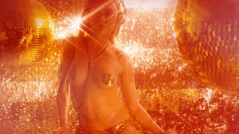 Beautiful woman dancing in disco setting with colourful overlayed zoom effect Stock Footage 101063250
