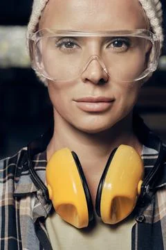 Beautiful woman in her 40s in protective gear Stock Photos