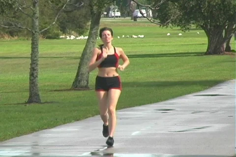 Beautiful Woman Jogging (1) Stock Footage