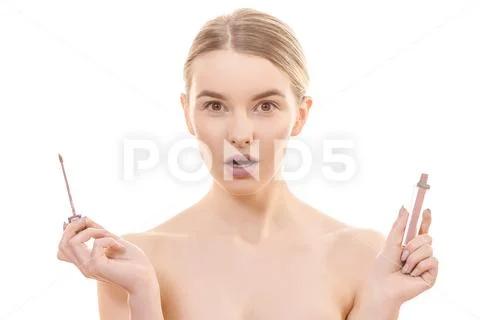 The beautiful woman with a lip gloss on the white background Stock Photos