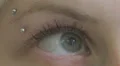 Beautiful woman looks up - macro HD Footage
