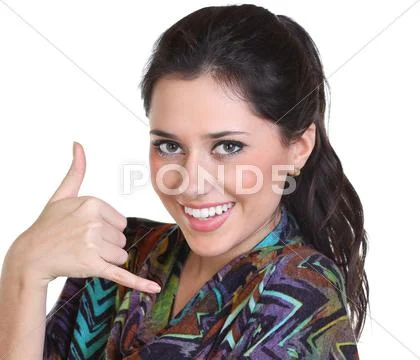 Beautiful woman making a call me gesture Stock Photos