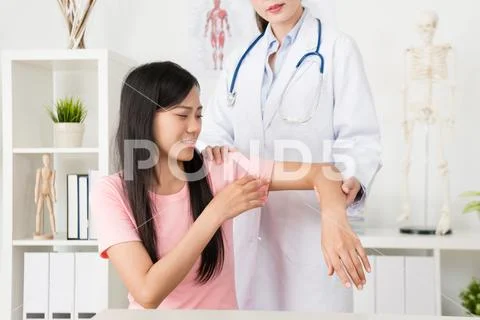 Beautiful woman patient hurt arm feeling suffering Stock Photos