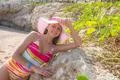 The beautiful woman pose on the beach Photo