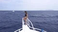 The beautiful woman pose on the yacht. Wide angle 4k or 4k+ Resolution
