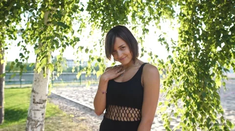 Beautiful woman posing for the camera Stock Footage 68544348