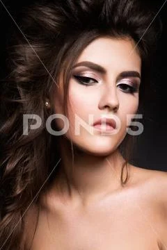 Beautiful woman with professional make up Stock Photos