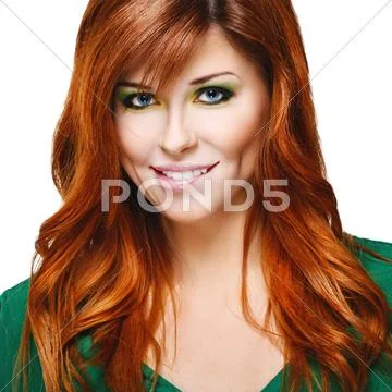 Beautiful woman with red hair Stock Photos