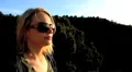 Beautiful woman savors sunset HD Footage