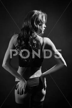 Beautiful woman show her slim body, monochrome Stock Photos