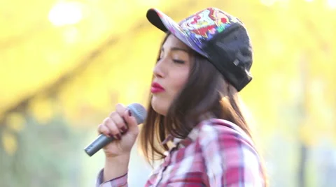 Beautiful woman singing Stock Footage 59556693