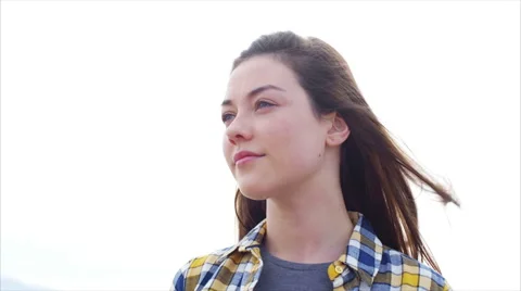 Beautiful woman smiling against clear sky Stock Footage 59082129