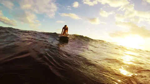 Beautiful Woman Sunset Surfing Stock Footage