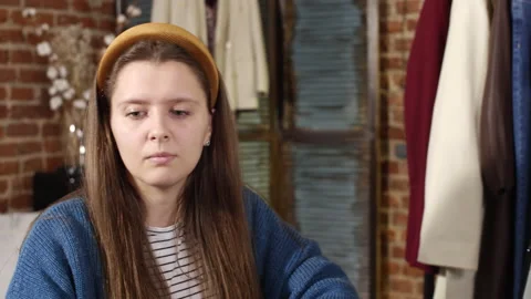 Beautiful Woman Taking Notes while Working in Online Shop Stock Footage 141759668