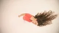 The beautiful woman turn her head. View from above 4k or 4k+ Resolution