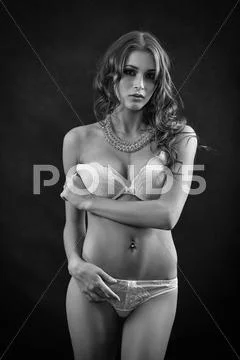 Beautiful woman undressing Stock Photos