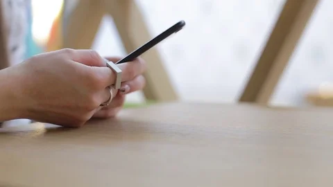 Beautiful woman using digital tablet browsing the internet in cafe interior Stock Footage 84817091