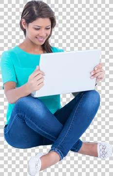 Beautiful woman using laptop while sitting on white background Stock Photos