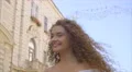 The beautiful woman walk on the street. Slow motion. Wide angle 4k or 4k+ Resolution