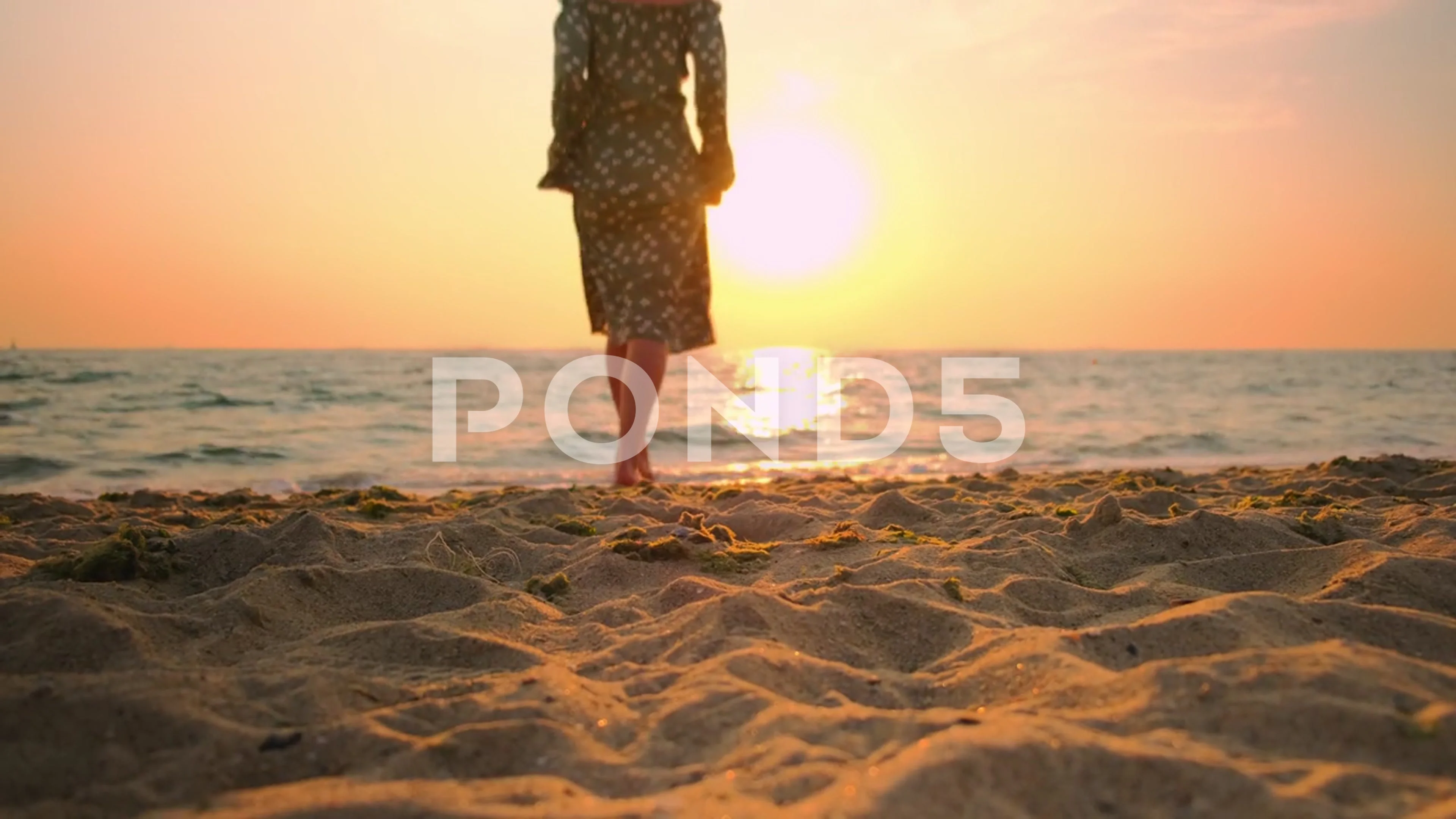 Beautiful girl walking on best sale the beach