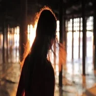 Beautiful Woman Walking Under The Jetty On A Bright Sunny Day Stock Footage