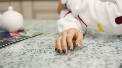 Beautiful woman’s hands on table. Gesture, elegance. Without face. Nice Stock-Footage 100124644