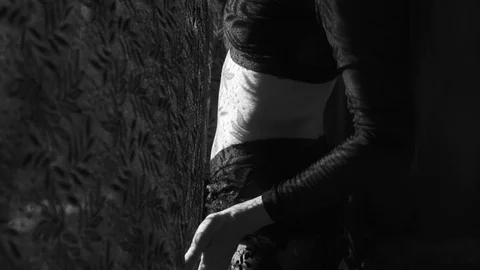 Beautiful woman's portrait with lace pattern shadow and sun light on her face Stock Footage 90173797
